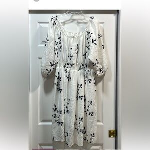 NWT Kindred dress with navy and white embroidery; skirt portion is lined.